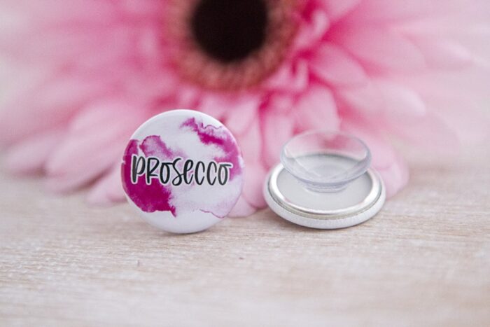 Saugnapf Button Prosecco